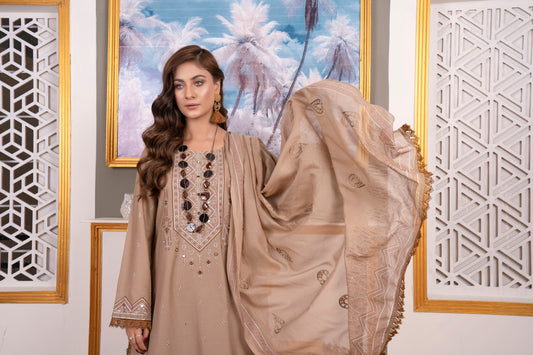 a woman standing in front of a painting